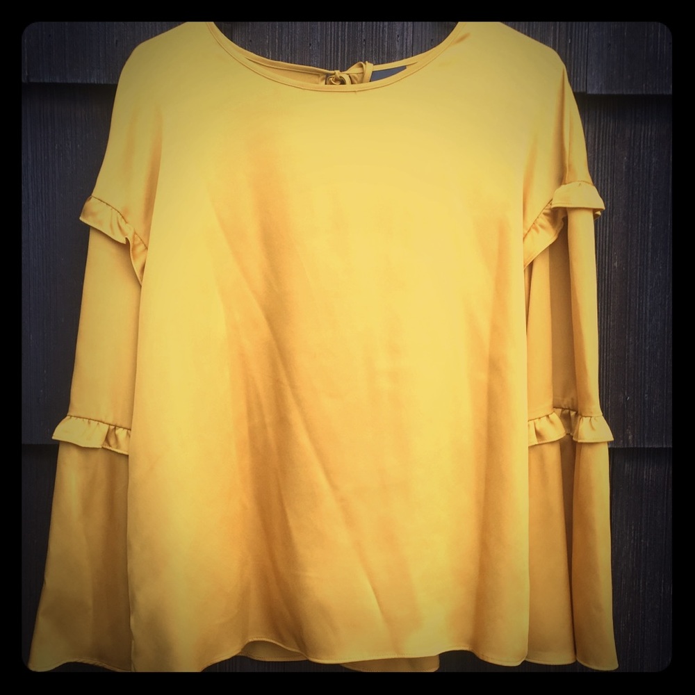 Gold long sleeved shirt